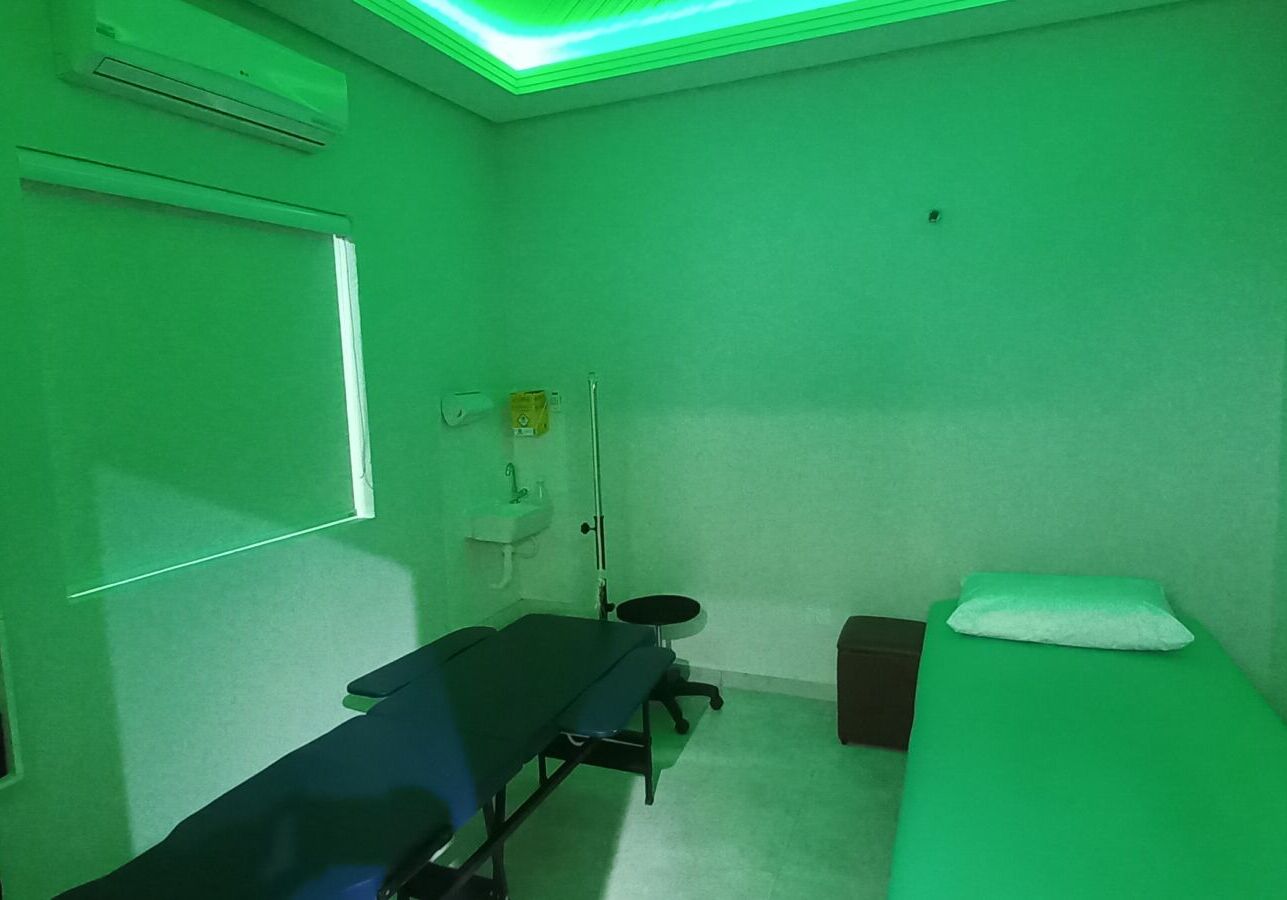 sala acupuntura Fisiocare Tremembé iluminação verde